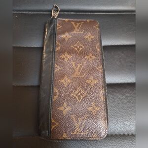 Louis Vuitton Vertical Zippy Wallet from the Monogram Macassar Collection